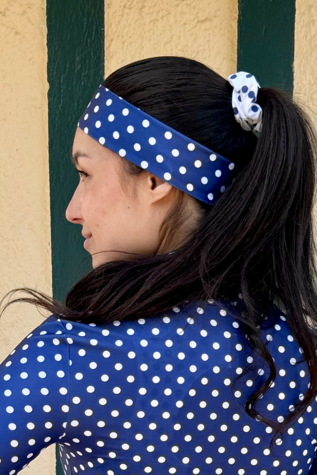 White scrunchie with blue polka dots